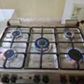SAR 830,  Simfer 5-Burner Gas Cooker With Oven And Samsung Microwave Oven