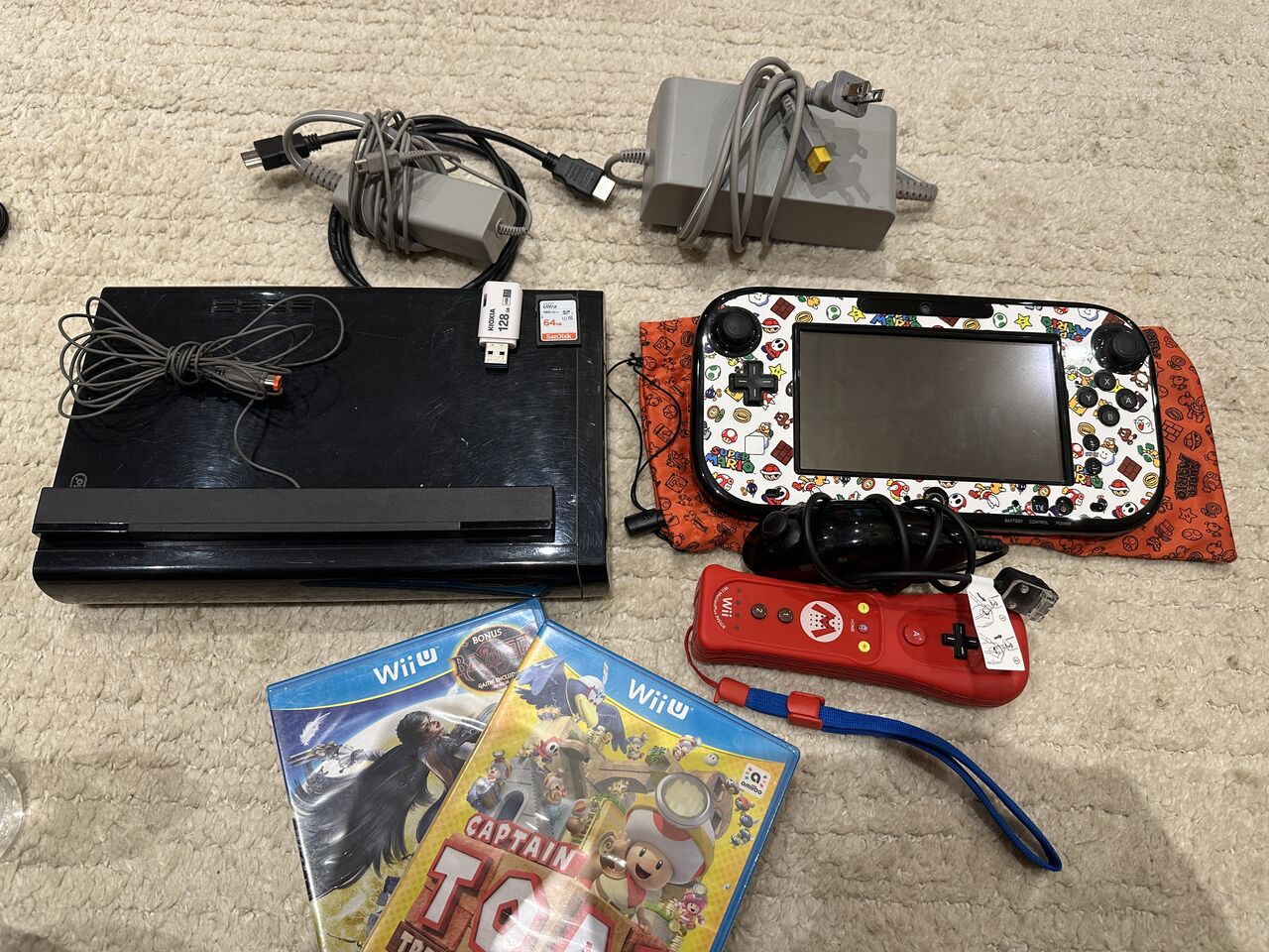 Riyadh, Video Games, SAR 900,  Wii U + 128 GB Flash Memory + 64 GB SD Card + Wiimote Mario Edition + 2 Brand New Games