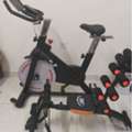 SAR 525,  Compact Home Gym Combo: Spin Bike + Ab Machine In One Space‑saving Setup, Perfect For Full