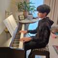 Offers Music Lessons: Piano, Singing, Guitar, Drums,etc