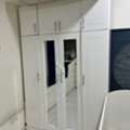 SAR 250,  Large 4-Door White Wardrobe With Overhead Storage Cabinets & Mirrors