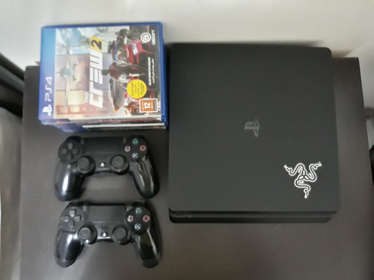 Riyadh, Electronics, SAR 1150,  PS4 Slim 1TB + 2 Controllers + 7 Games | Excellent Condition