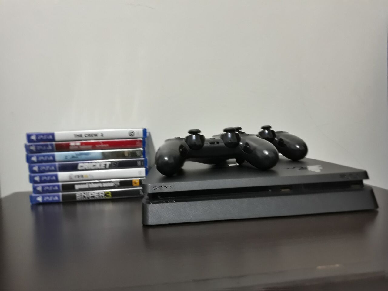 Riyadh, Video Games, SAR 1150,  Ps4 Slim 1TB + 2 Controllers + 7 Games | Excellent Condition