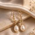 INR 399,  Elegant Pearl Drop Leaf Earrings