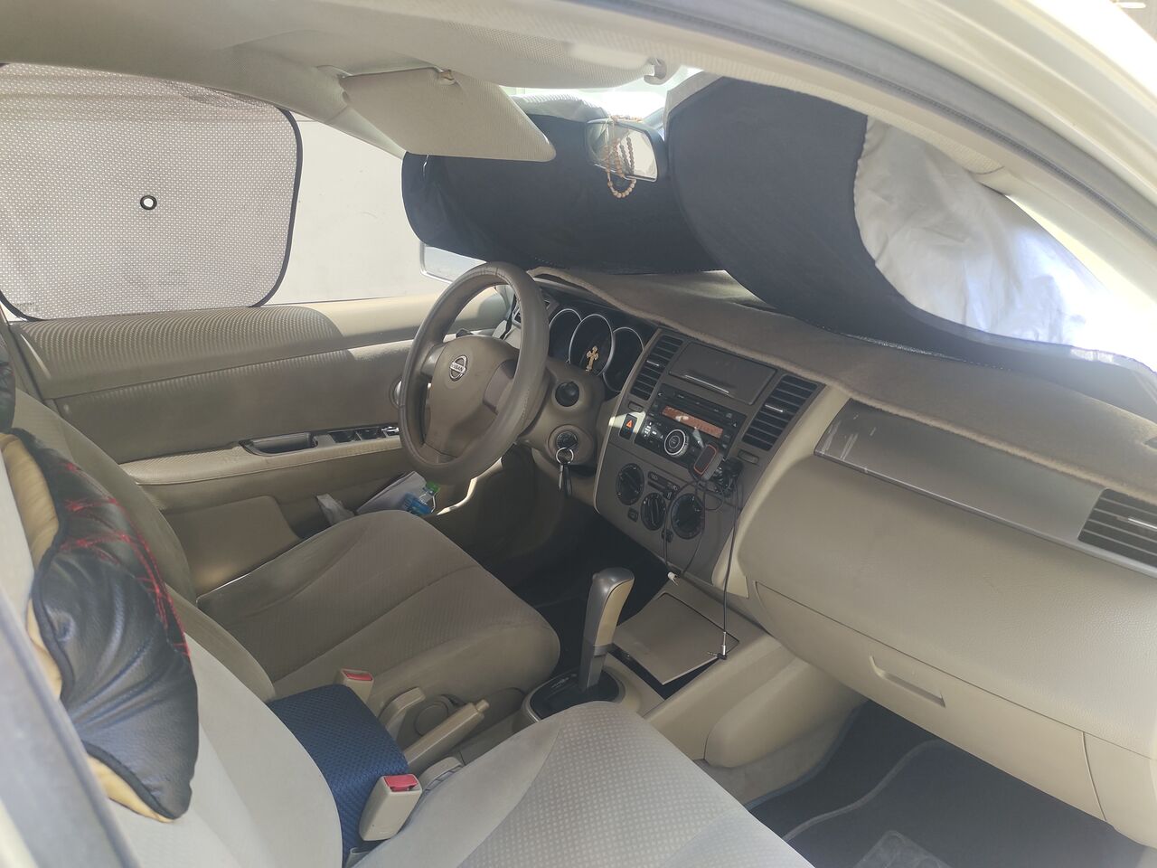Manama, Vehicles, Cars & Trucks , BHD 1450,  NISAN TIIDA,  2012,  Automatic,  185009 KM,   Model  1.8 L Passing & Insurance . June 2027 Price BD 1450