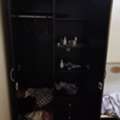 BHD 10,  Round Table & Two Door Cupboard For Sale