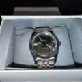 SAR 1550,  Rolex Datejust 41, Featuring A Fluted Bezel, Silver Dial With Roman Numerals, And A Jubile