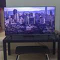 SAR 320,  Television (TV)  + Black Wooden Table Below TV