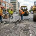 Need Asphalt Driveway Repair? Fix Cracks & Potholes Before They Spread