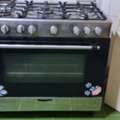 BHD 75,  Midea 5-Burner Gas Cooker With Oven &ndash; 39346100