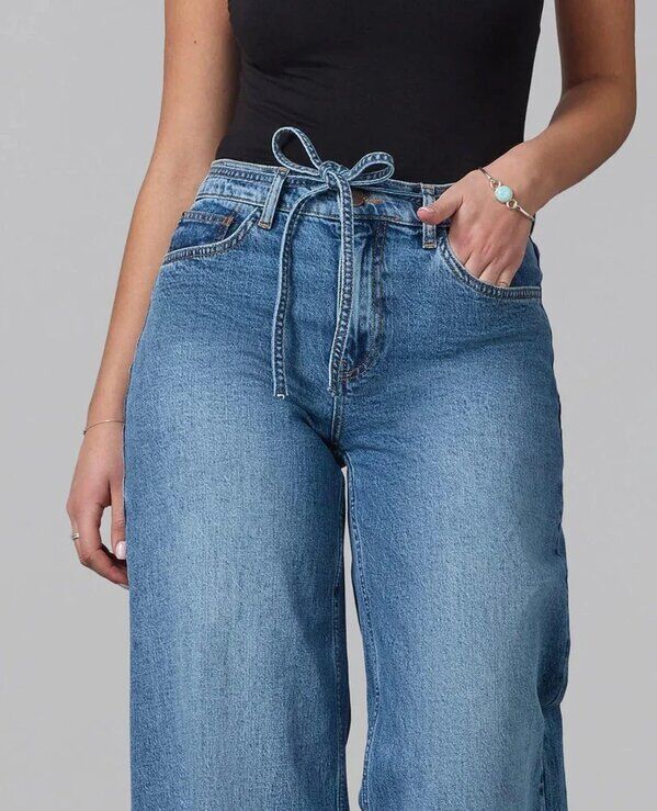 New York, Business, Raw Hem Jeans: Chic Light Wash Slim Fit Denim Style
