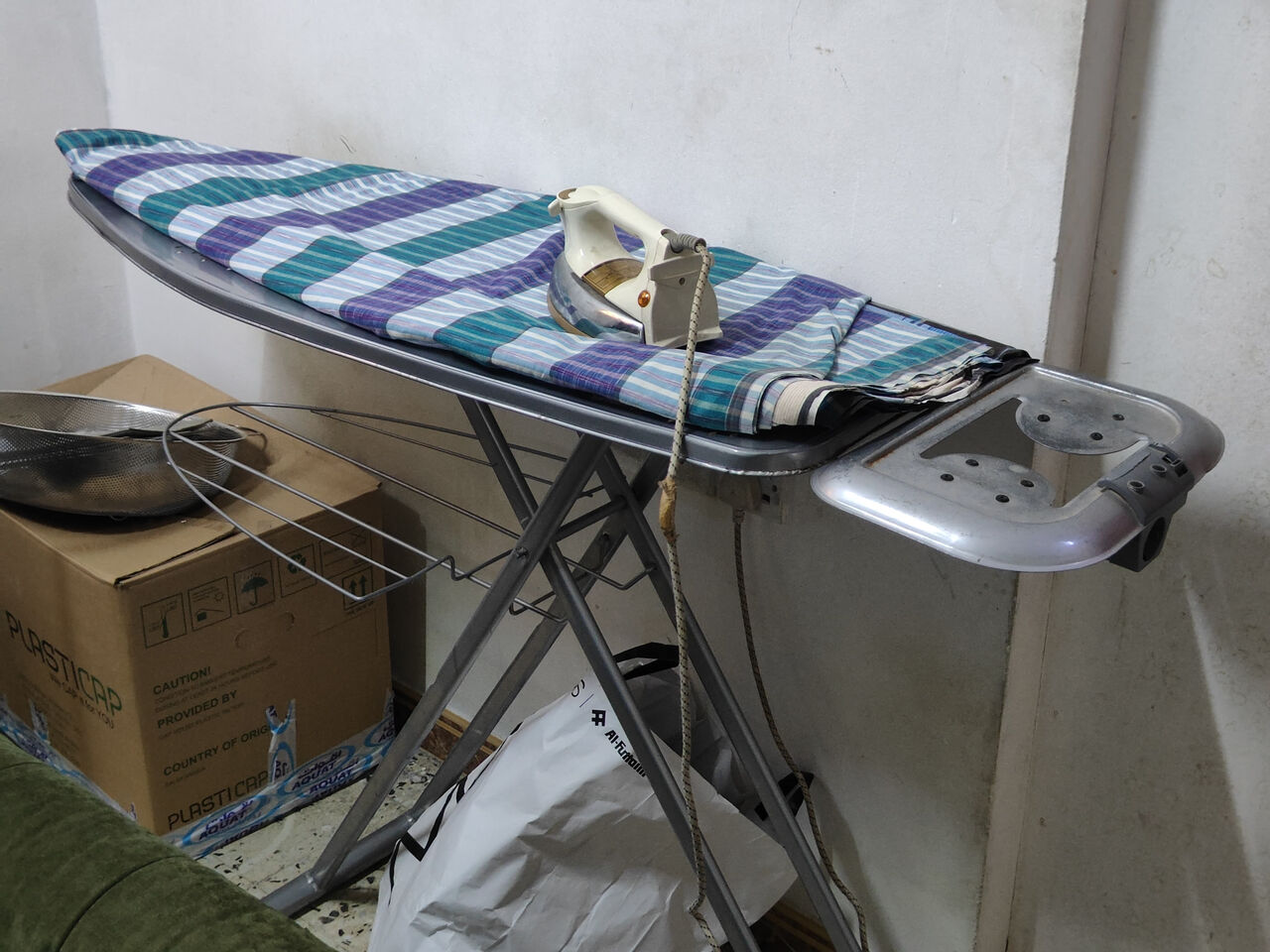 Riyadh, Household Items, SAR 50,  That Is A Standard Foldable Metal Ironing Board Fitted With A Blue And Green Plaid Fabric