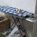SAR 50,  That Is A Standard Foldable Metal Ironing Board Fitted With A Blue And Green Plaid Fabric