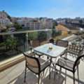 JOD 14000/year,  Furnished,  2 BR,  Beautiful Two-Bedroom Apartment With A Stunning Balcony View In Abdoun 🌿🏡