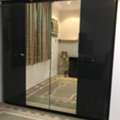 SAR 1200,  Large 4-door Wardrobe/cupboard With Two Full-length Mirrored Doors For Sale