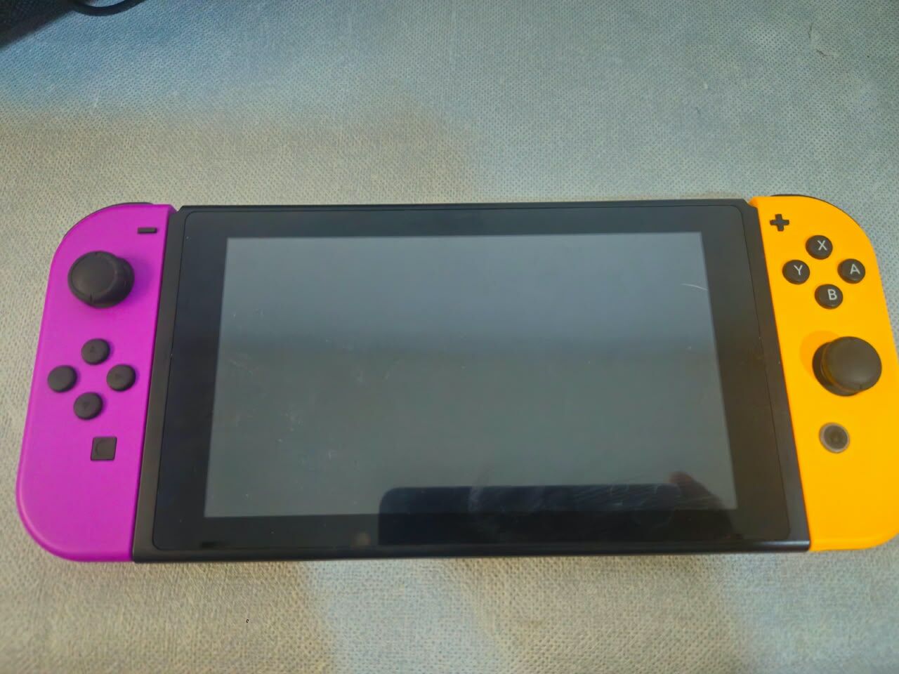 Riyadh, Electronics, SAR 800,  Nintendo Switch V1 With Orange And Purple Joycons
