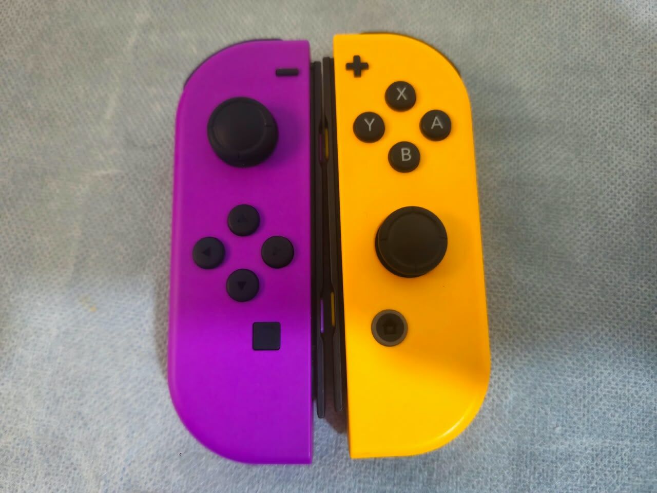 Riyadh, Electronics, SAR 800,  Nintendo Switch V1 With Orange And Purple Joycons