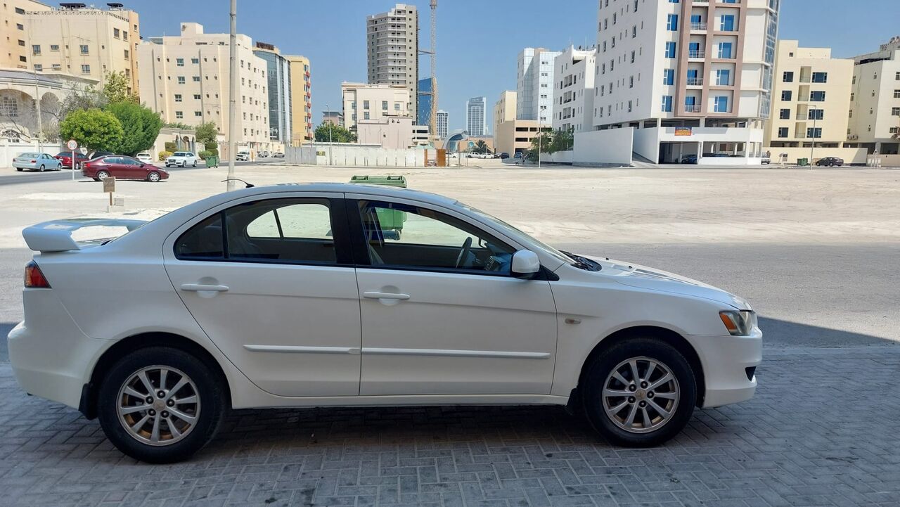 Manama, Vehicles, Cars & Trucks , BHD 1650,  Mitsubishi Lancer 2.0 L Full Automattic Very Good Condatio,  2014,  Automatic,  200000 KM,  N