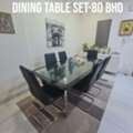 BHD 75,  HOME CENTRE DOUBLE GLASS DINING TABLE