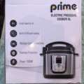 SAR 150,  Prime Electric Pressure Cooker (6L) Box Displaying A 1000W Power Rating, A 6-liter Capacit