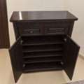 SAR 200,  Free Delivery | Dark Brown Wooden Shoe Rack With Drawers