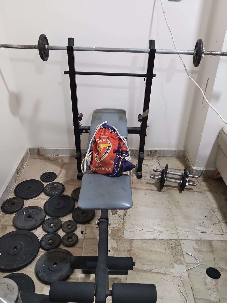 Al Thuqbah, Appliances, SAR 350,  Complete Cast Iron Home Gym Set- Barbell Bar, Dumbbell, Adjustable Bench Press And Weights