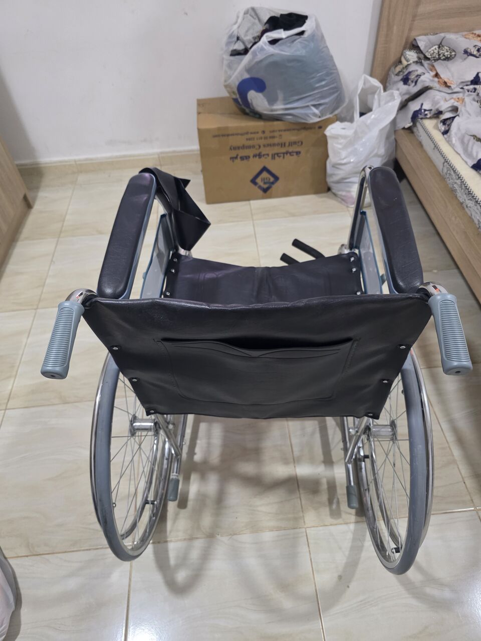 Al Rakah Al Janubiyah, Furniture, SAR 200,  Foldable Chrome Wheelchair With Self-Propelling Wheels - New And Only Used For Two Weeks