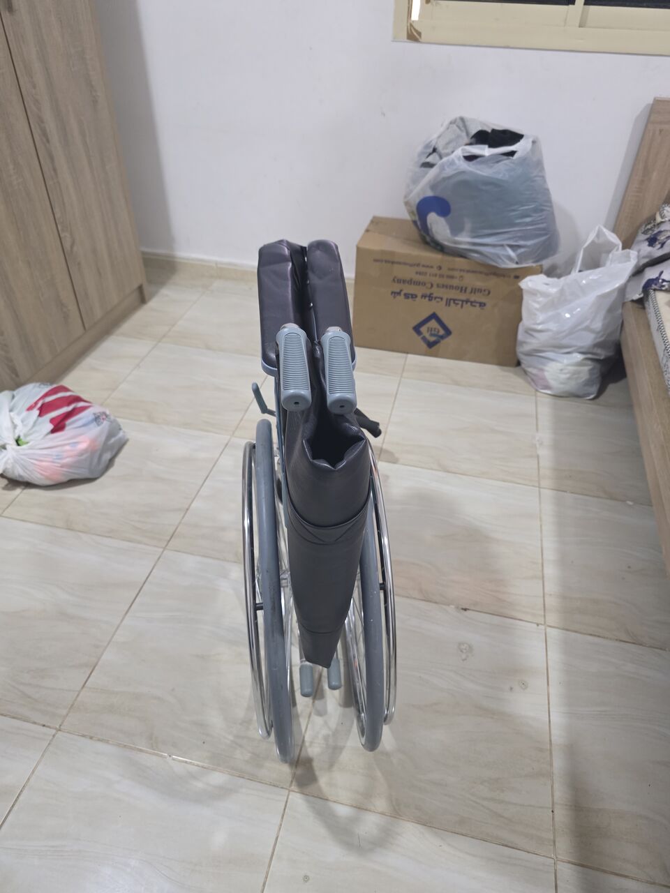 Al Rakah Al Janubiyah, Furniture, SAR 200,  Foldable Chrome Wheelchair With Self-Propelling Wheels - New And Only Used For Two Weeks