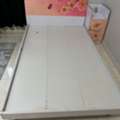 Bed With Side Table And Carpet