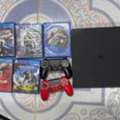 SAR 750,  PS 4 Slim (2 Controllers) 5 Games