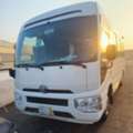TOYOTA COASTER BUS AVAILABLE FOR RENT WITH DRIVE