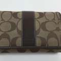 SAR 500,  Coach Hampton Signature Flap Wallet