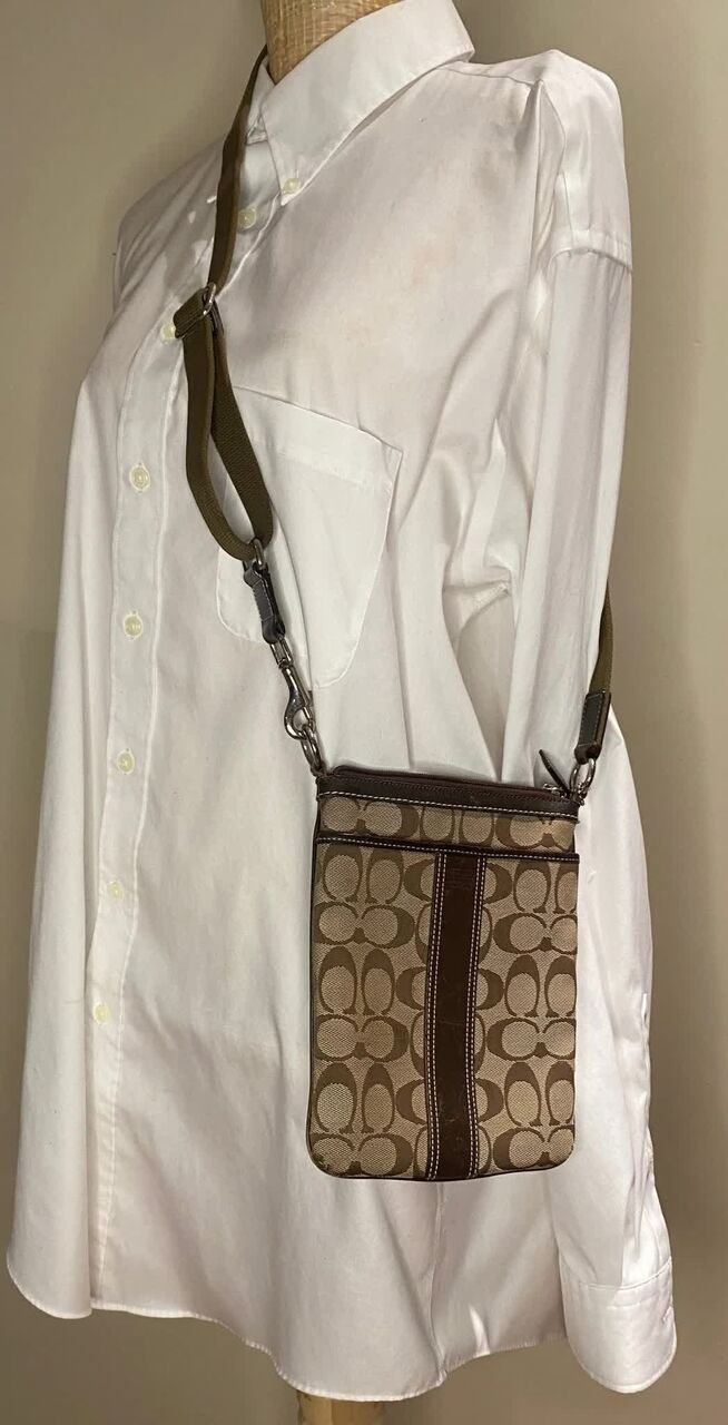 Riyadh, Purses & Wallets, SAR 1000,  Coach Signature Stripe Swingpack Crossbody Bag