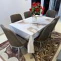 SAR 800,  6 Seater Dining Table With A Vase, A Rug And Table Cloth.